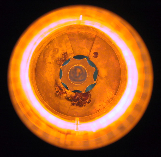 Custom Glass Preform Being Fed Into Hot Draw Oven