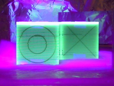 Orthogonally Layered Scintillating Glass Fiber Optic Cube